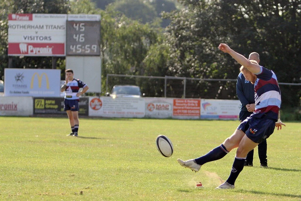 Lloyd Hayes Kicks The winning Penalty.jpg