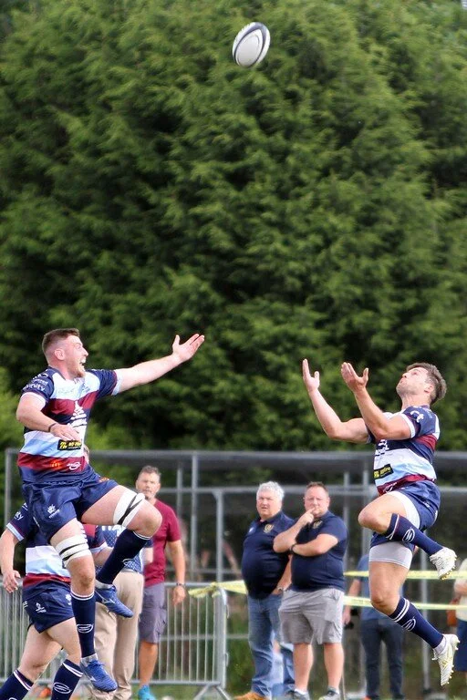 Matt Smith and Jamie Cooke Jump For Same Ball.jpg