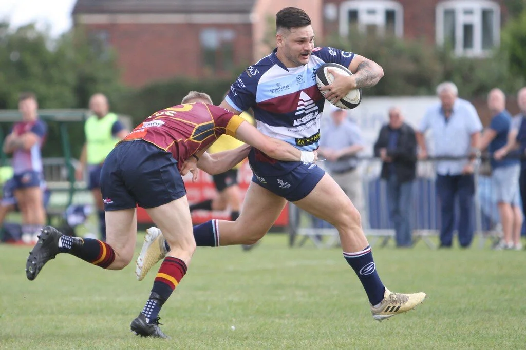 Matti Williams Breaks Brushes Off Tackle.jpg