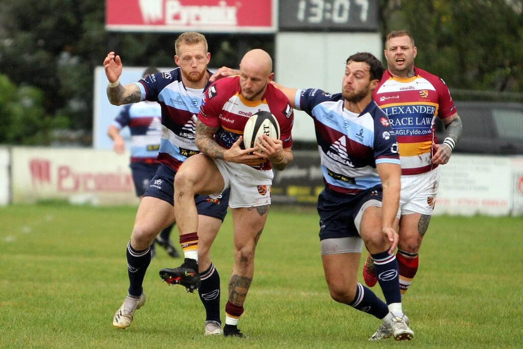 Lloyd Hayes and Jamie Cooke Tackle Fylde Catcher.jpg