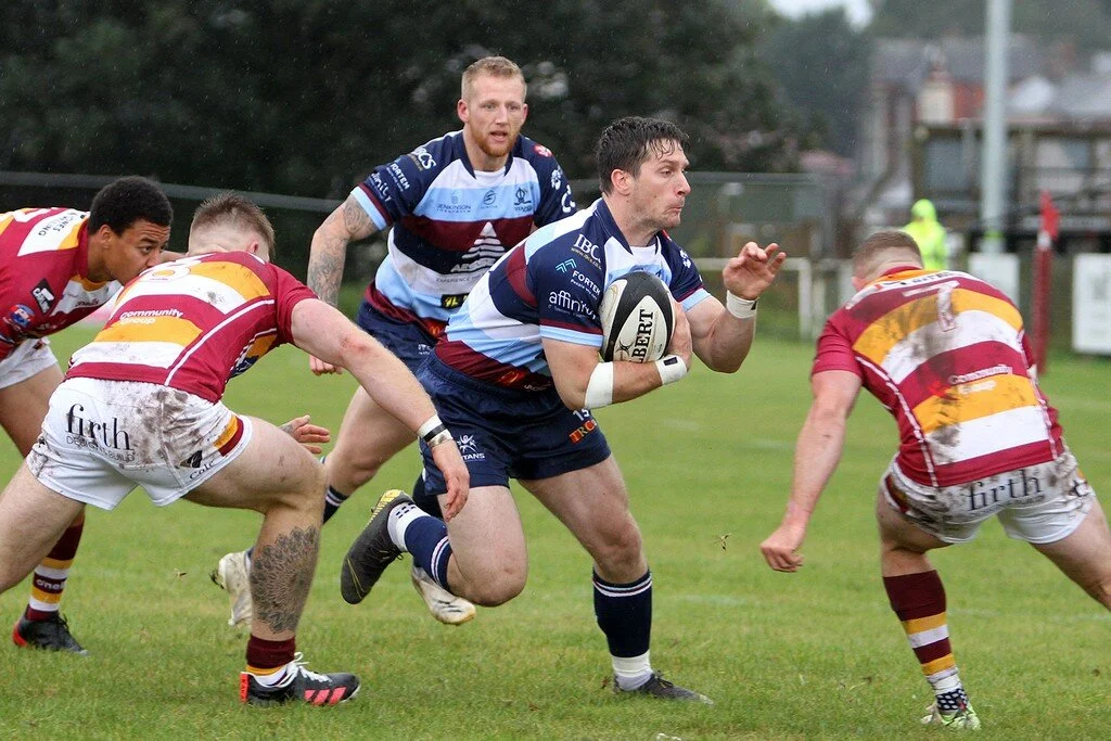 Mat Clark Prepares To Be Tackled.jpg