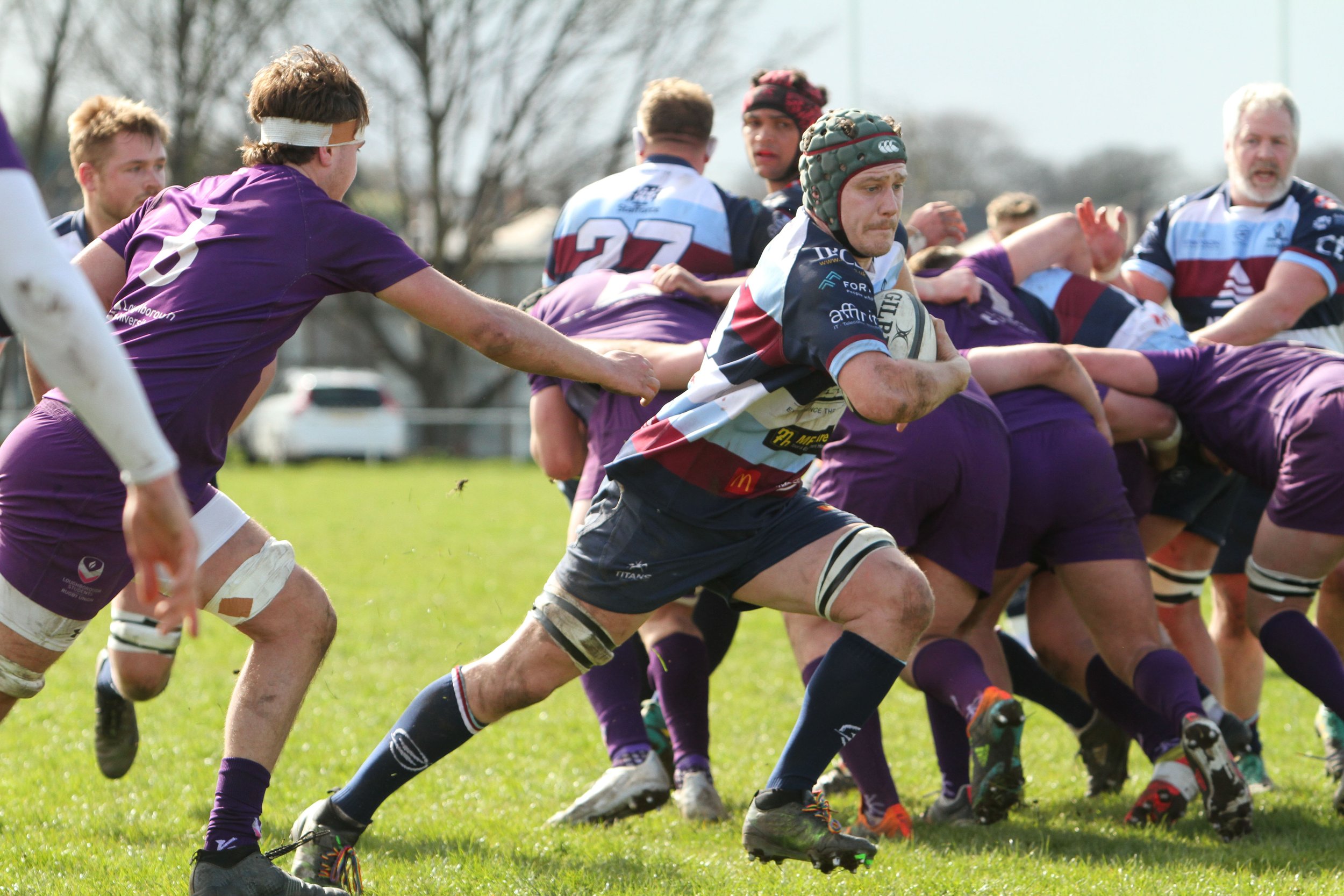 Lewis Allan Breaks Free Of Tackle.jpg