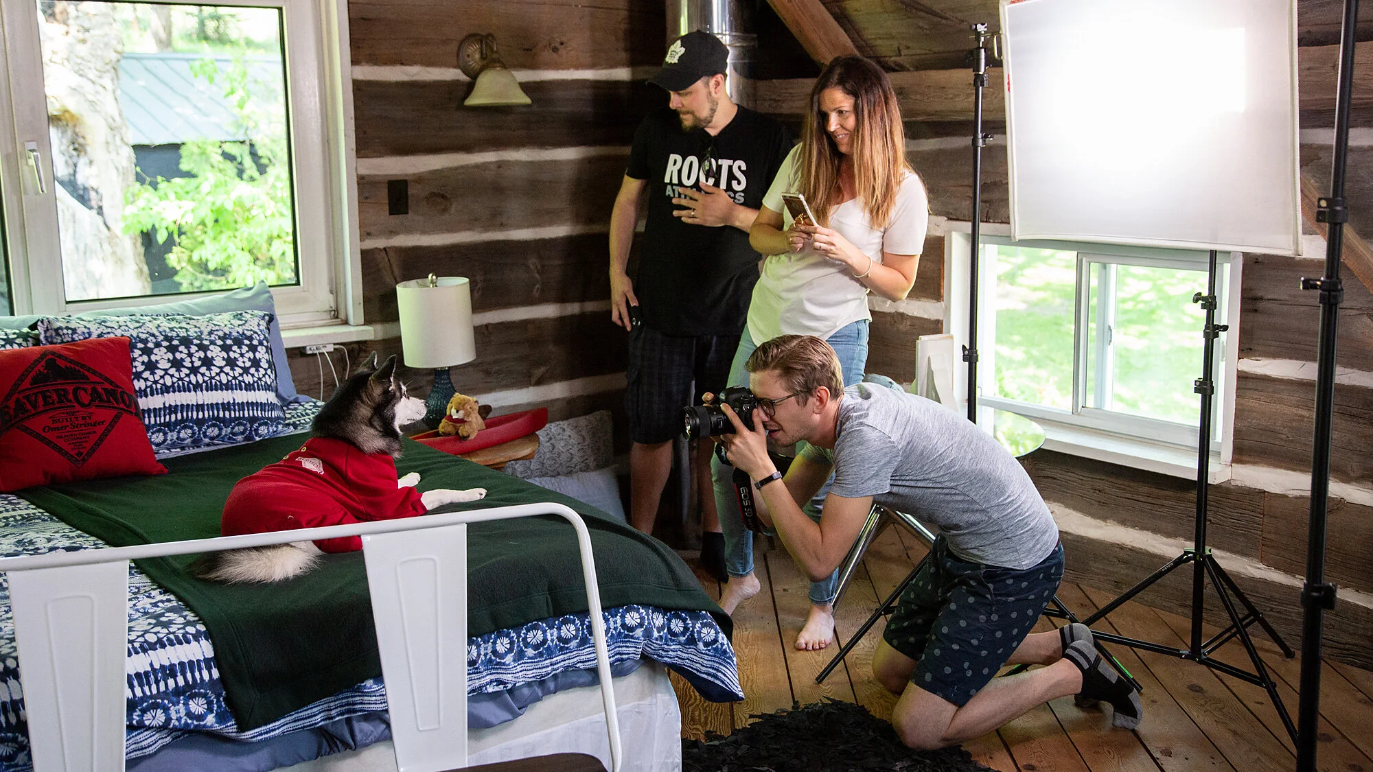 Eugen photographing a campaign for Roots in a remote cabin.