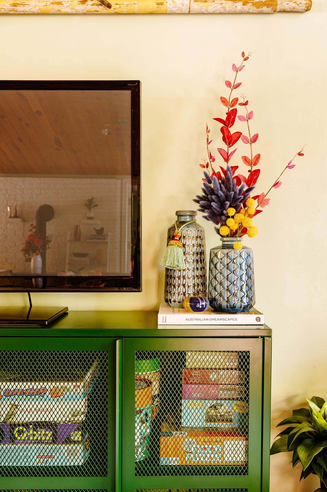 Interior photography of a bright, colourful living room by Worker Bee Supply.