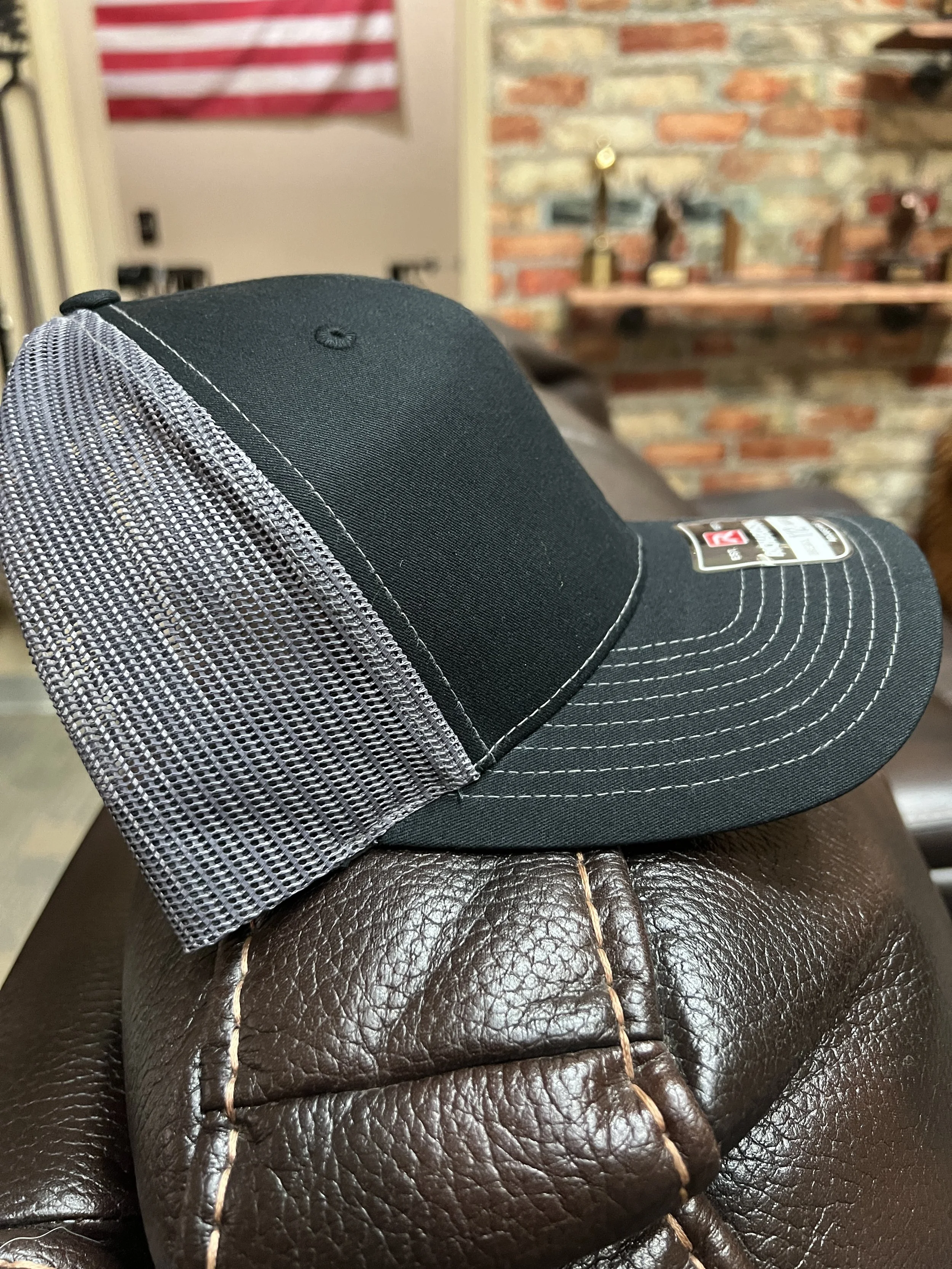 Richardson 112 Trucker Black-Charcoal with gray patch profile.JPG