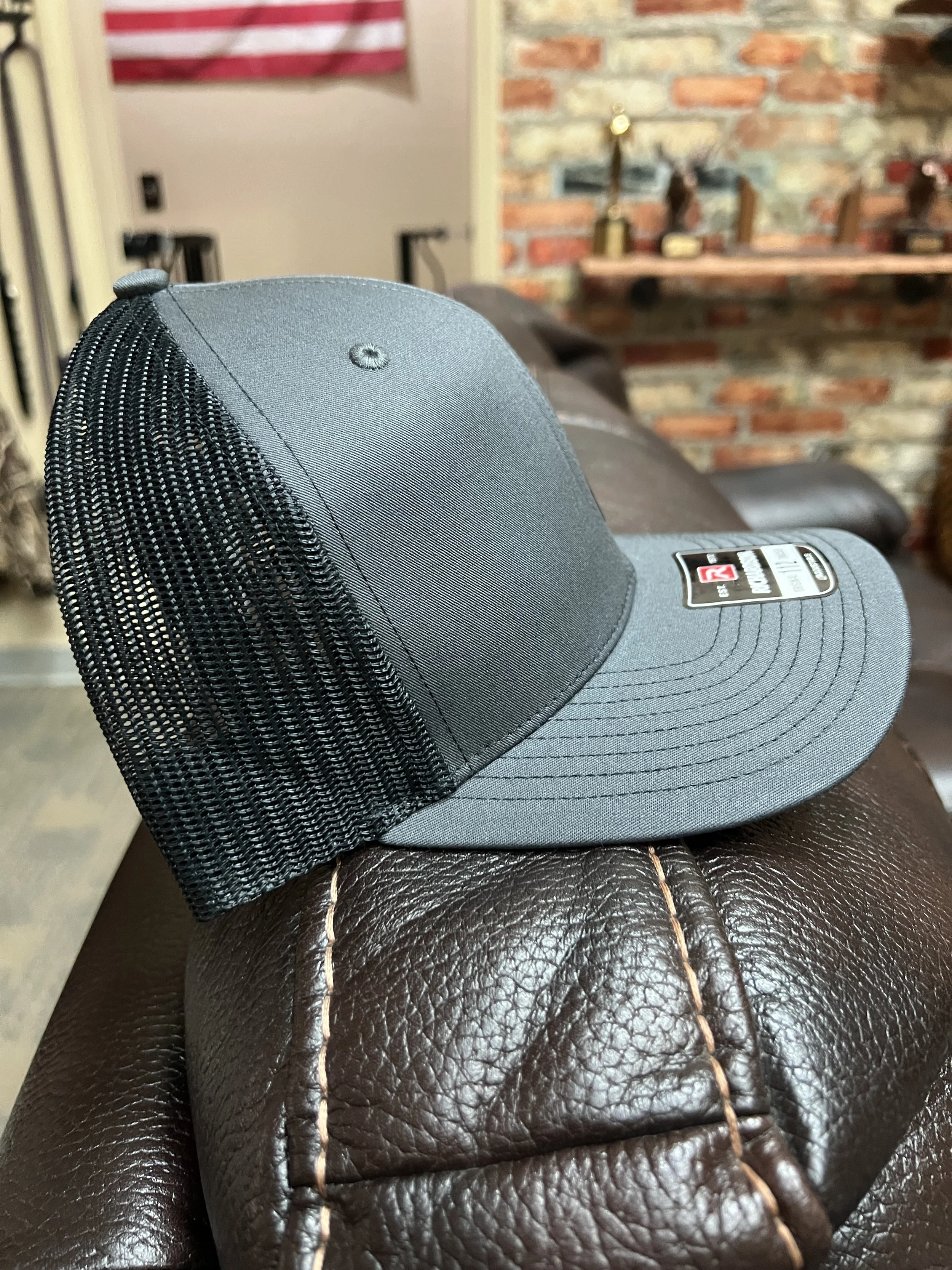 Richardson 112 Trucker Charcoal-Black with rawhide patch profile.JPG