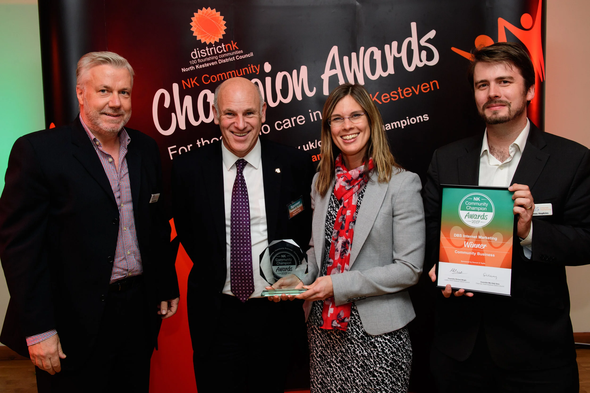 Keith Philips, Duncan & Toplis presents the Community Business Award to DBS Internet Marketing, Navenby.