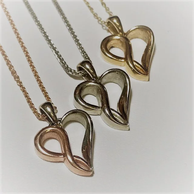 Custom design hearts in yellow, white, or pink and white gold