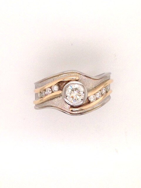 custom diamond two toned bezel ring