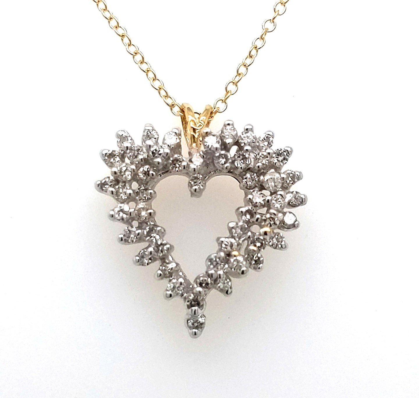 An estimated .50ctw diamonds make this dazzling heart pendant shine bright in our estate case. Come by and take a look &ndash; we are open until 5:30pm today! 🤍⁠
.⁠
.⁠
.⁠
#Vintagestyle #Estatejewelry #Heartpendant #Diamonds⁠