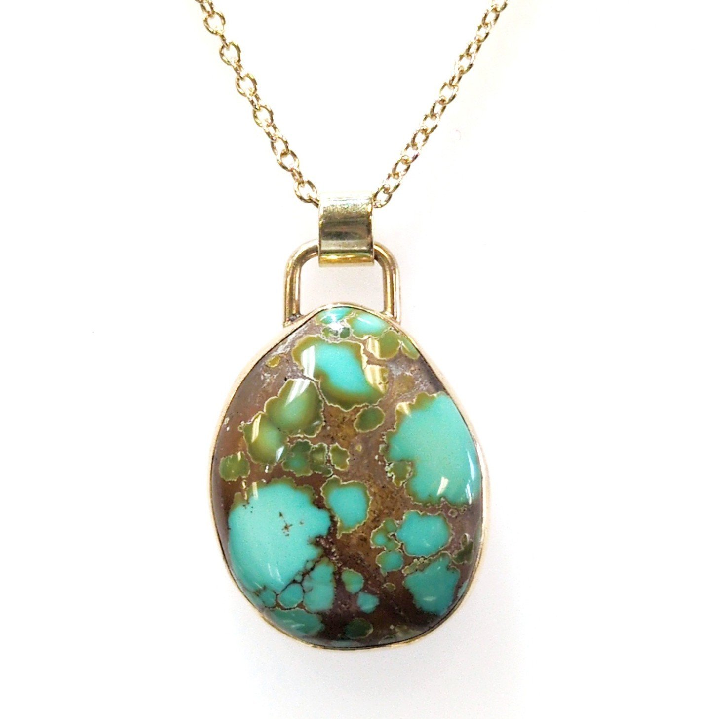 A beautiful piece of turquoise shows off a stunning matrix in this beautiful 14-karat gold estate pendant. We&rsquo;re open all week and would love for you to come in and take a look around! ⁠
.⁠
.⁠
.⁠
#Estatejewelry #Turquoise #Finejewelry⁠