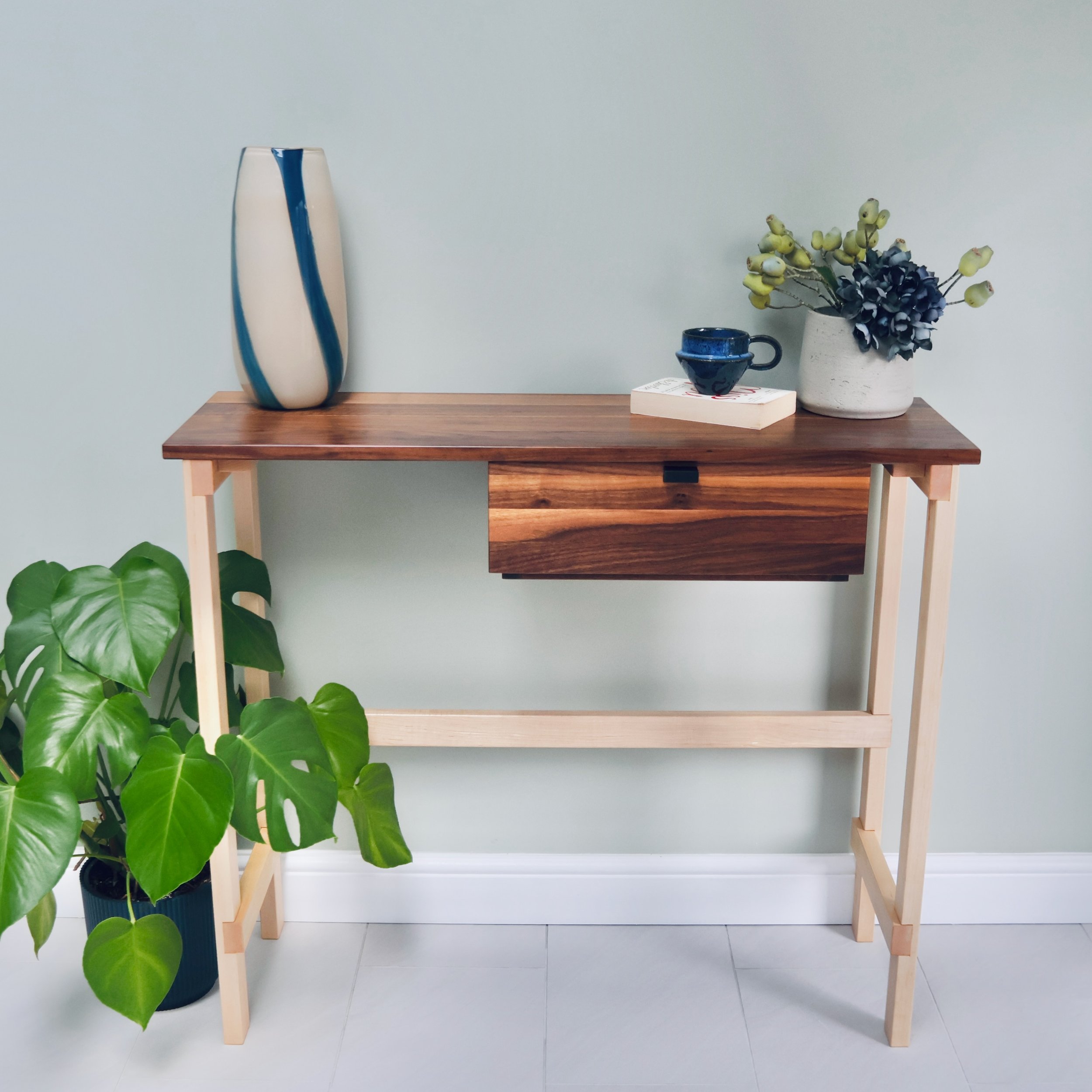 Bespoke walnut and maple console table