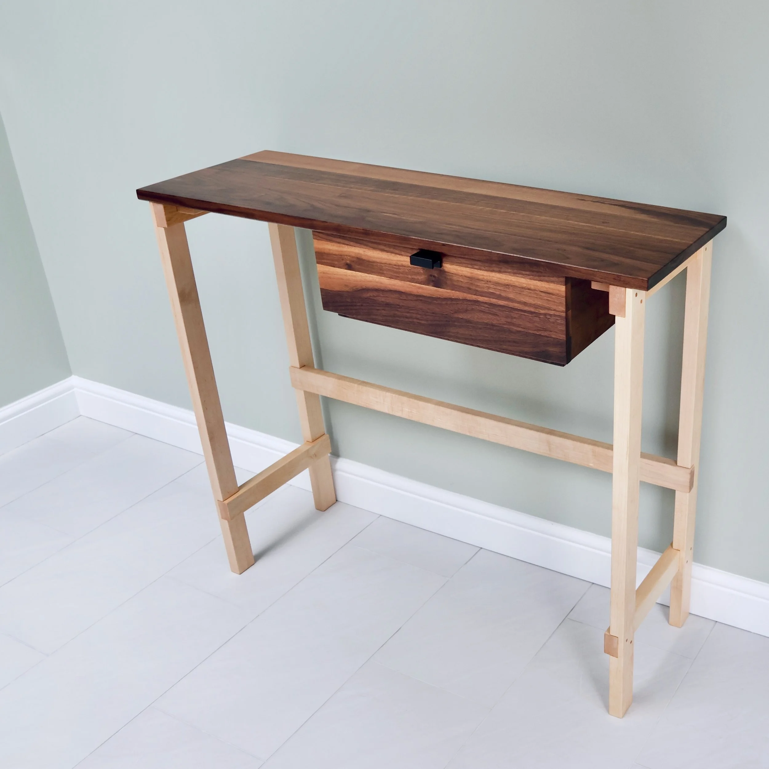 Bespoke walnut and maple console table side view