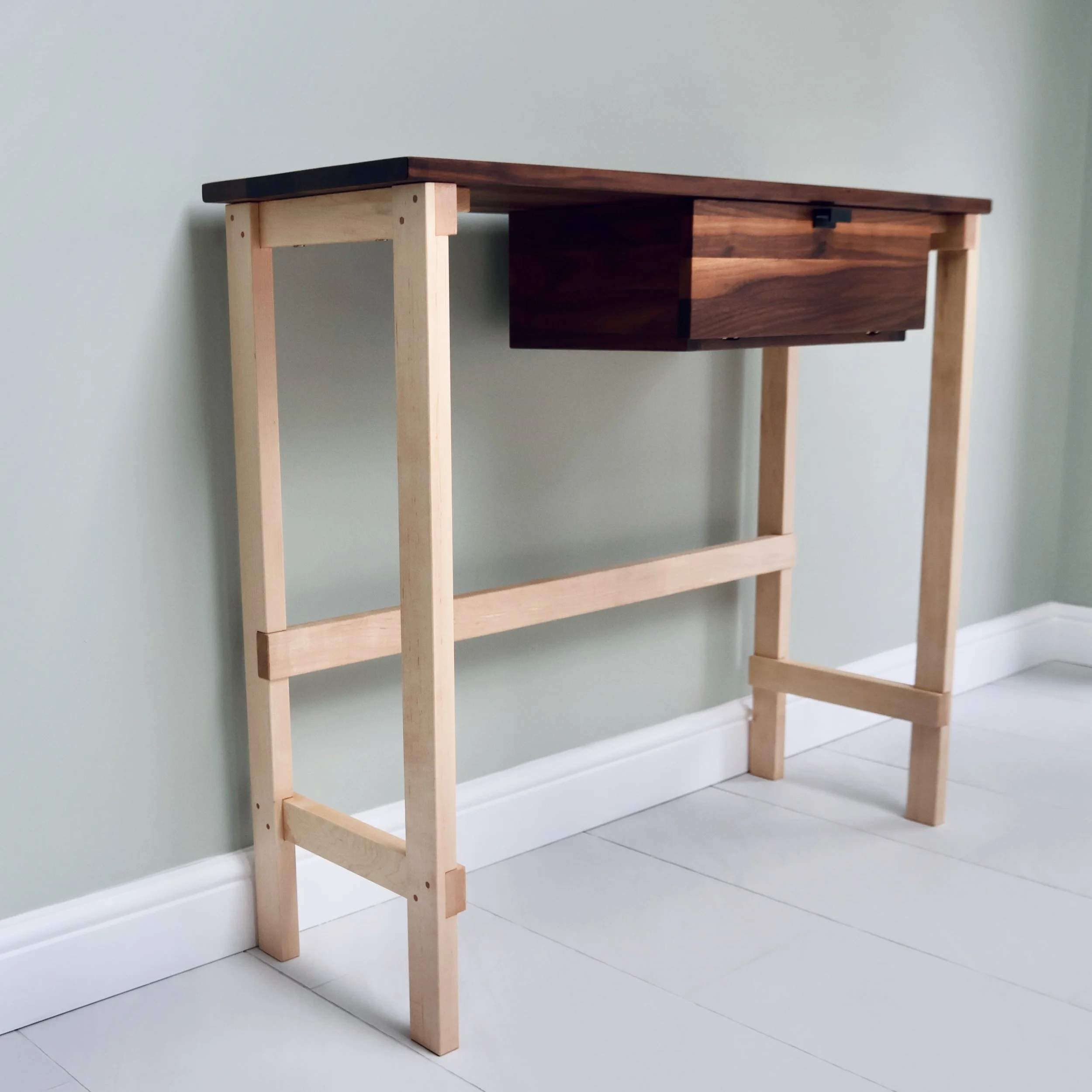 Bespoke walnut and maple console table side view