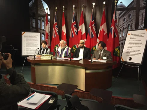 Myself along with a Protestant Minister, a Muslim Imam and a Sikh cleric releasing the Faith Leader's Statement in the Media Studio of our provincial legislative building at 9 AM May 30 erev Shavuot