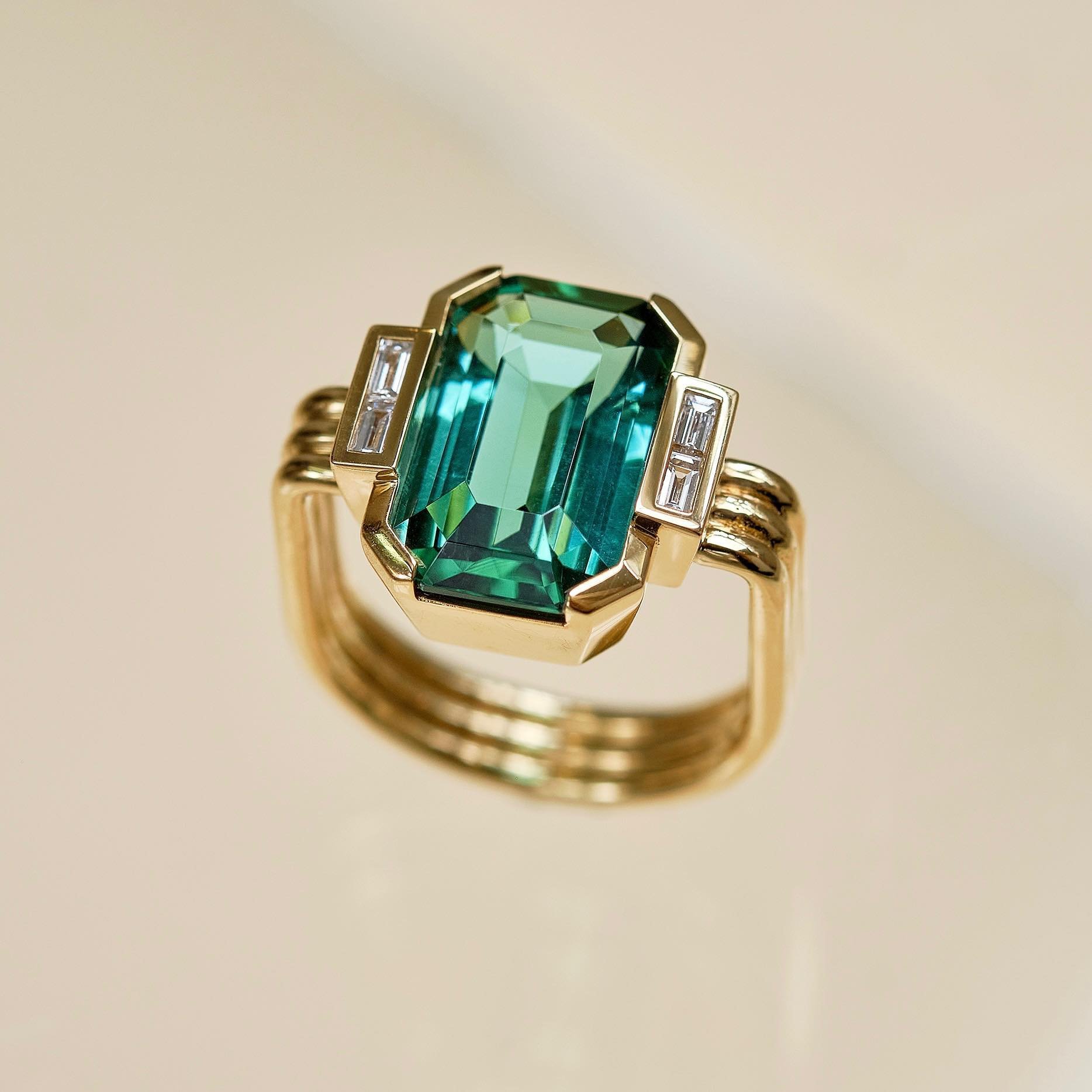 Pompidou ring with green tourmaline and diamonds. More pieces on our website.