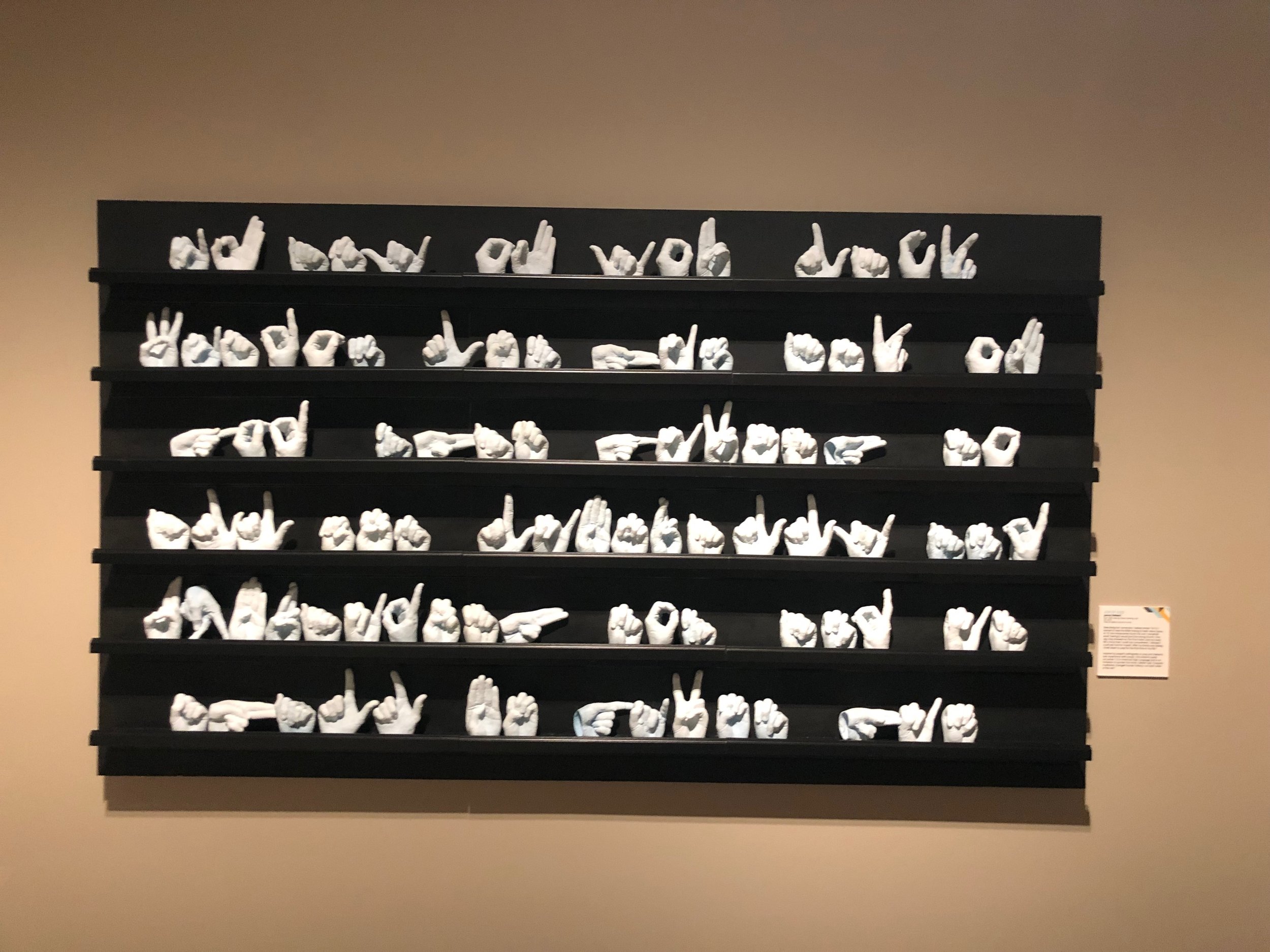 Ask of God by Janna Siebert. Glaze and glass sculpture on wood.