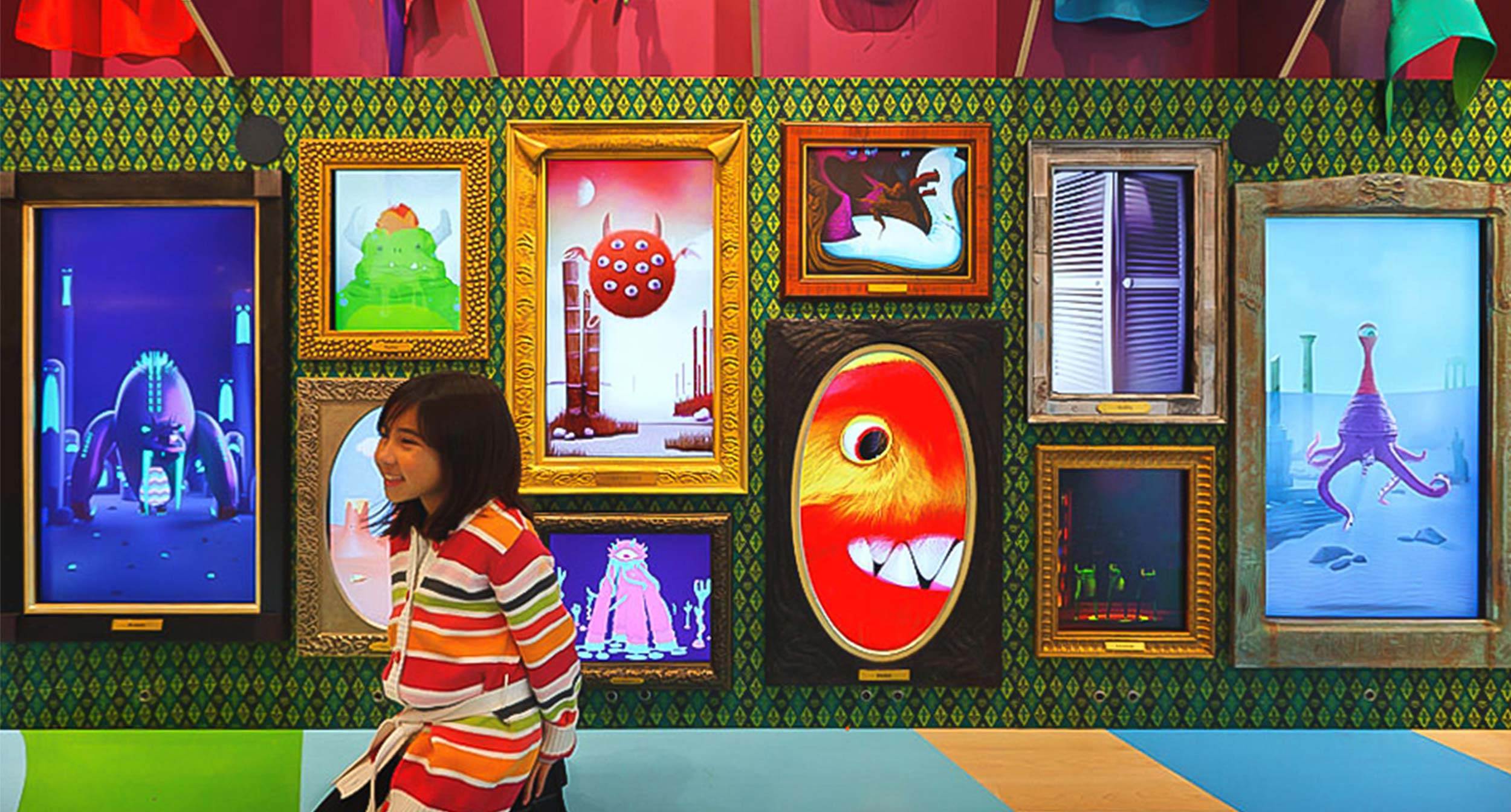 Girl and Interactive Monster Wall
