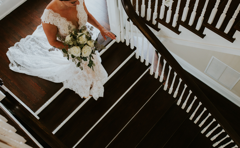 bride walking down stairs.PNG