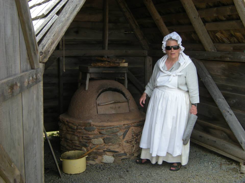   This is a reconstruction of an authentic oven of the type used by the Acadians. It is made of "bousillage", or cob, a mixture of clay, straw and gravel or coarse sand and was used to bake everything from bread to cookies. Visit during a festival an