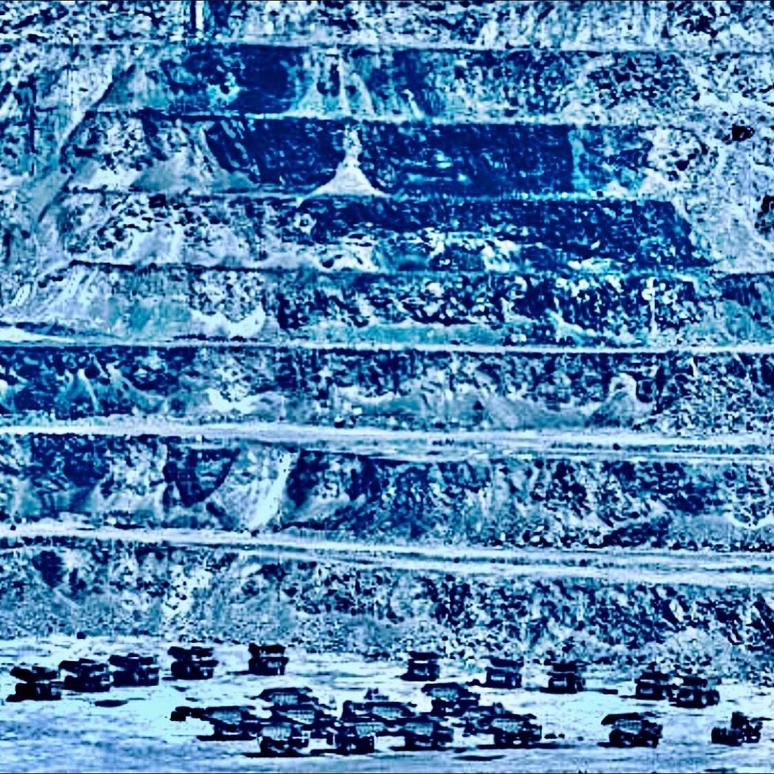 A pack of 22 haul trucks in Morenci, Copper Mountain Mining