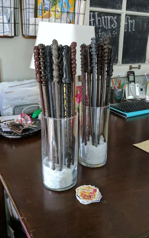 Guests received a sticker badge with their house crest, and wands made from cooking chosticks
