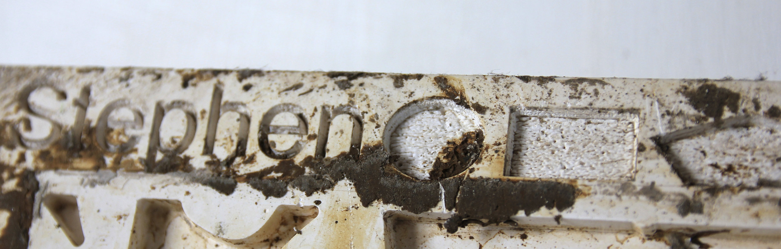 Laser etching onto plaster, as a cast for the clay (this is a photograph taken later on, so excuse the mud).