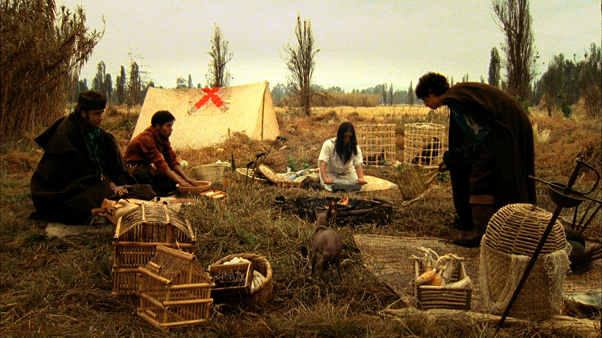 Fray Bernardino y su tropa acampando.