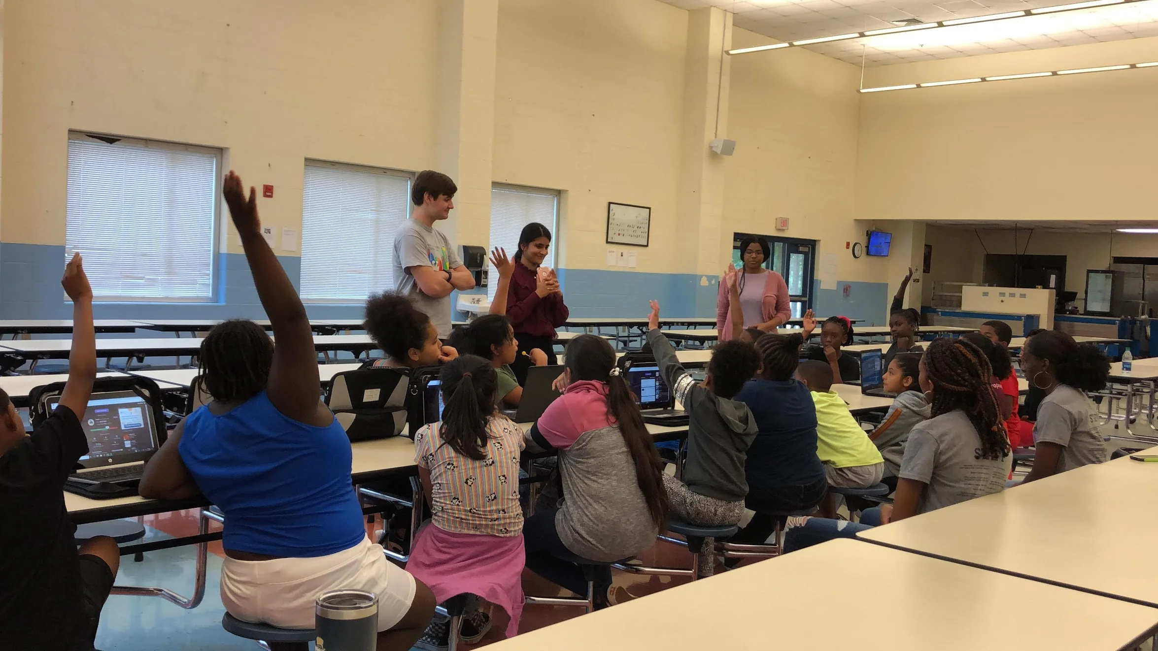 Cymone assisting as a Youth Ambassador during a Digital Literacy session on Online Safety & Awareness