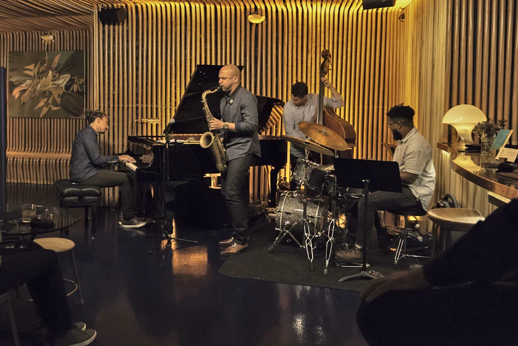 Tenor saxophonist Walter Smith III leads a Saturday night gig at Sam First, an authentic old-school jazz club built for the new millennium Photo by Maria Martin
