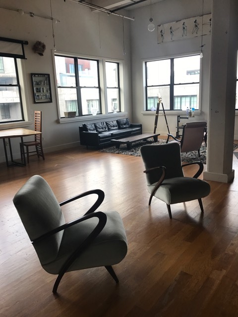 Our Buffa mohair chairs in a loft.