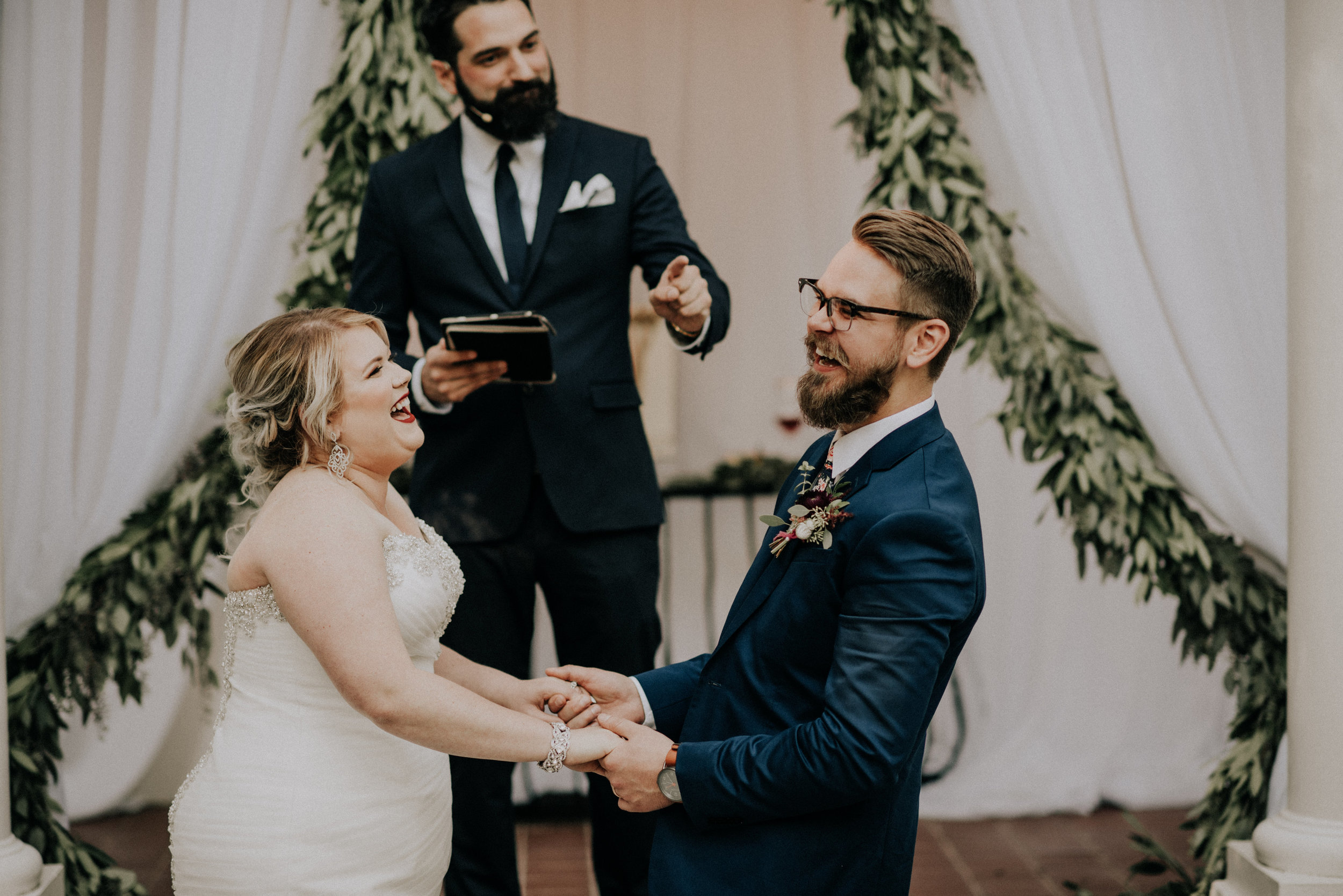 A bride and groom during their wedding ceremony at Gray Gables Estate