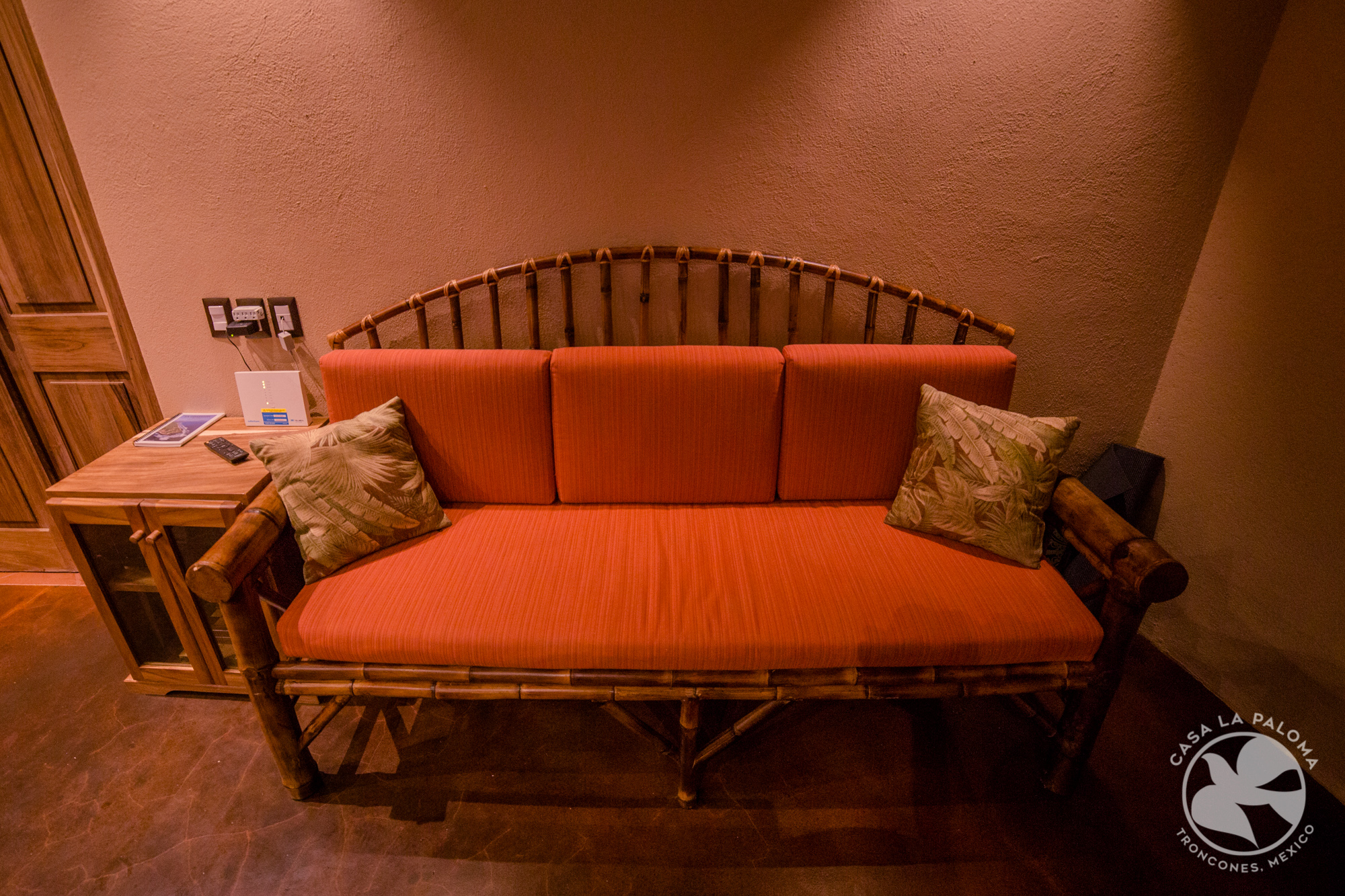 Bamboo couch in the corner!