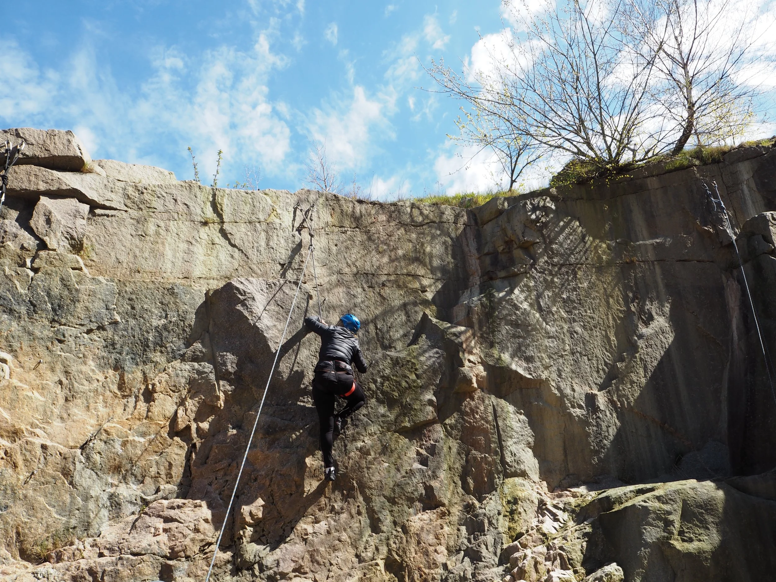 Rock climbing. Hanging on by the fingertips ...