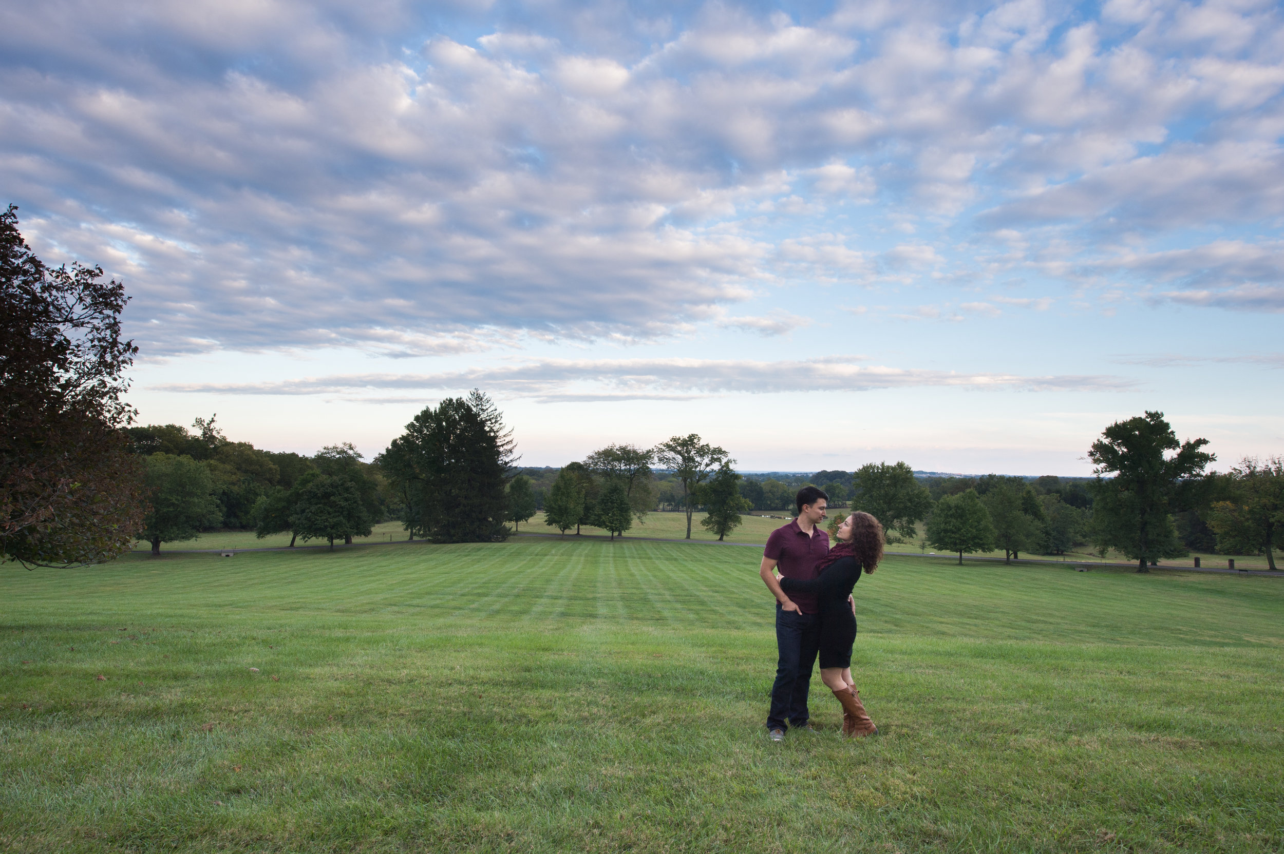 Couple standing in field at Morven Park for anniversary session