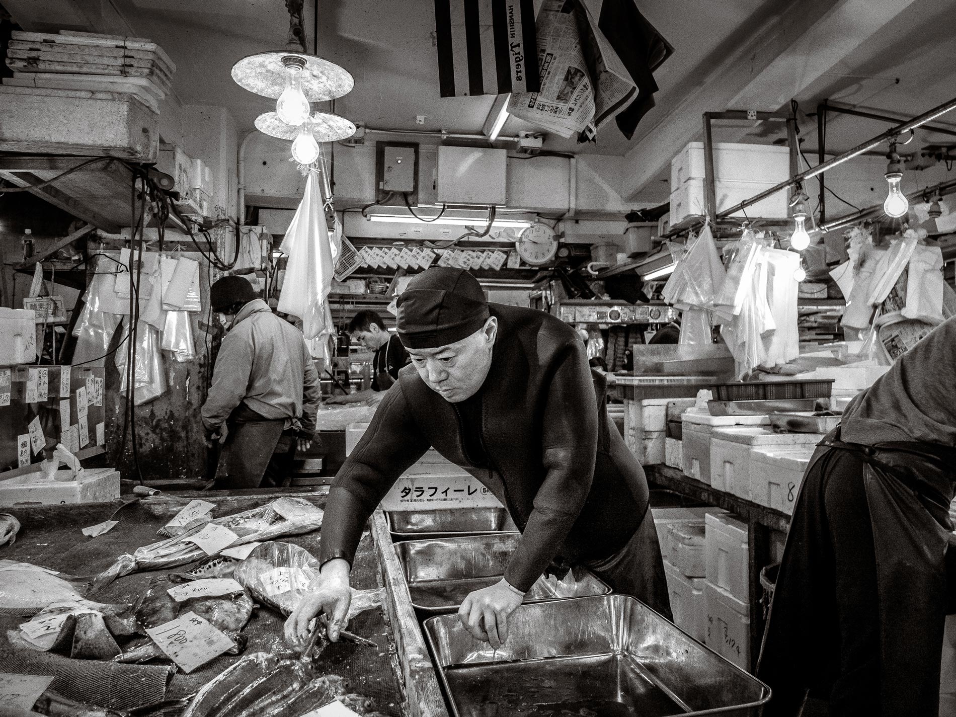 Wetsuit man Tsukiji fish market - Tokyo