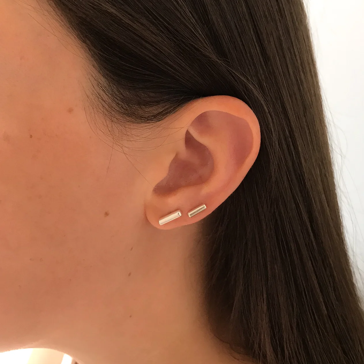 Ara the altar - Bar Earrings i and ii - Model.jpg