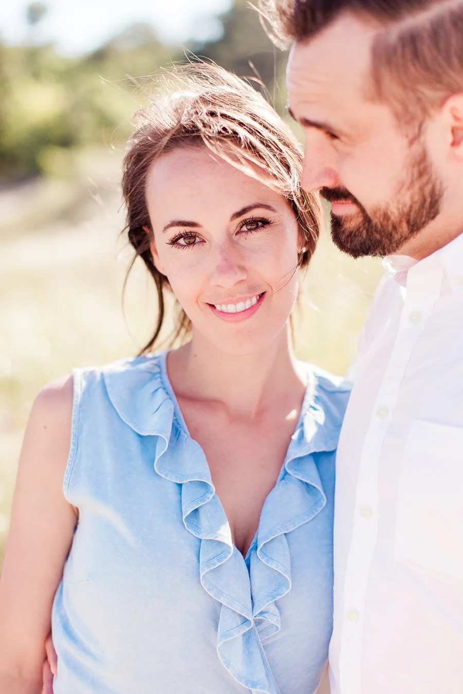Michigan couple photographer on beach