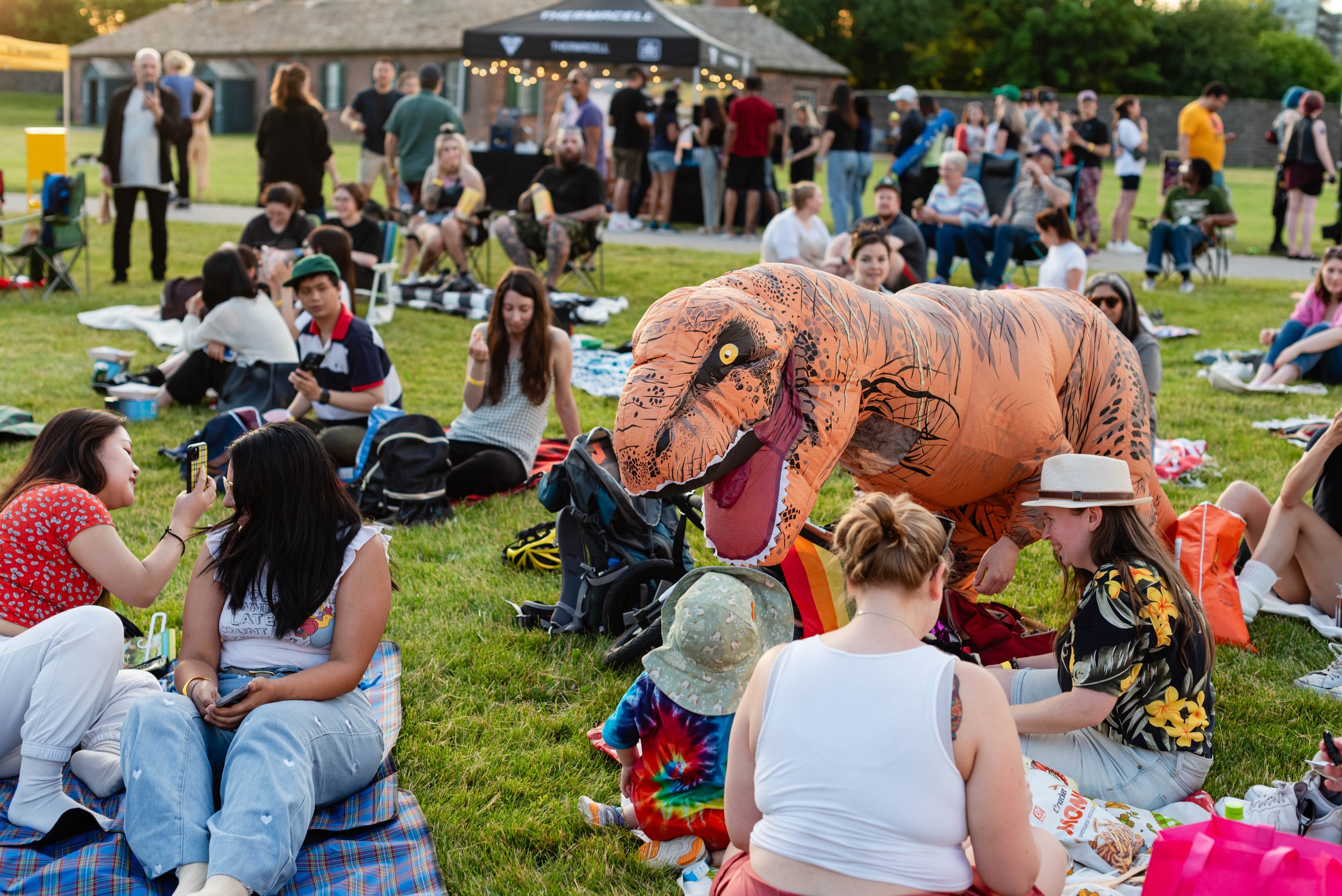  A costume dinosaur joins the crowd for a screening of JURASSIC PARK at Fort York 