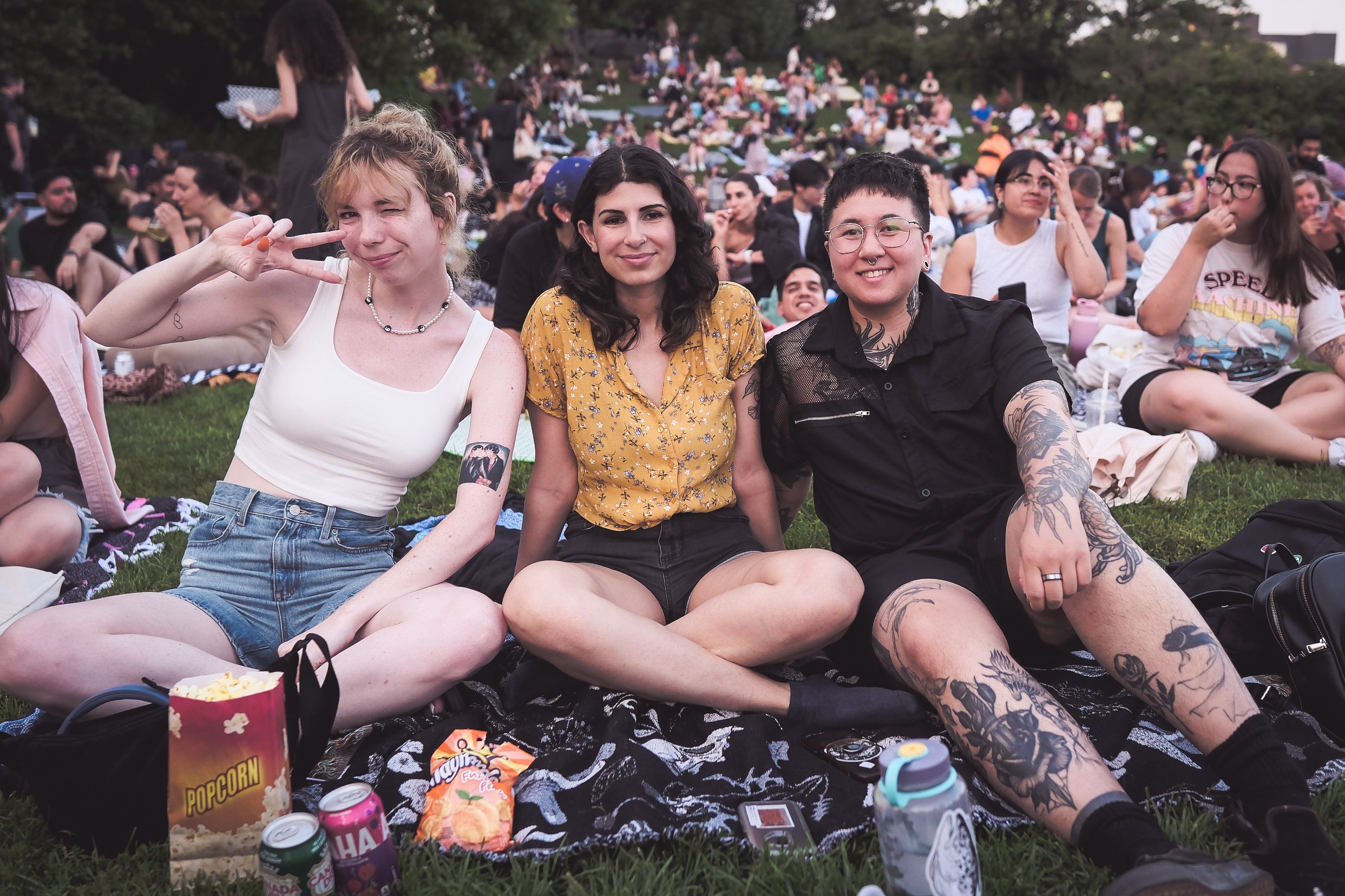  Attendees enjoy popcorn and snacks before a Corktown Common screening 