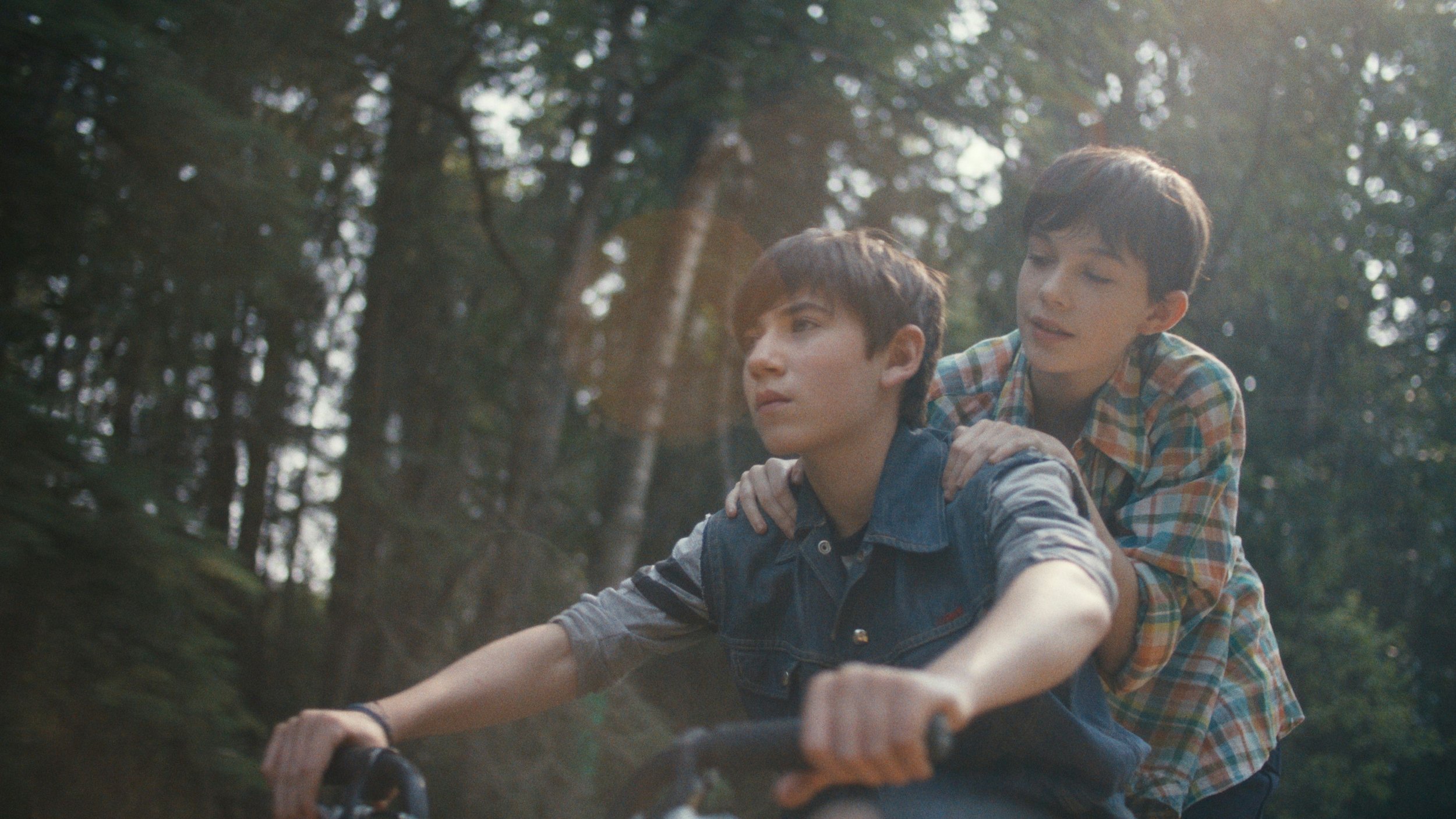 two-kids-riding-one-bicycle (1).jpeg