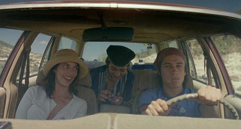 a-woman-looking-towards-a-younger-man-in-a-car.jpg