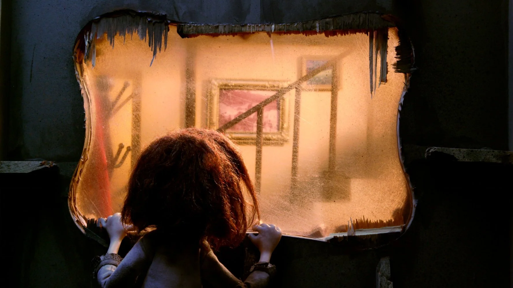 Foxed film - little child looking at a staircase through a window
