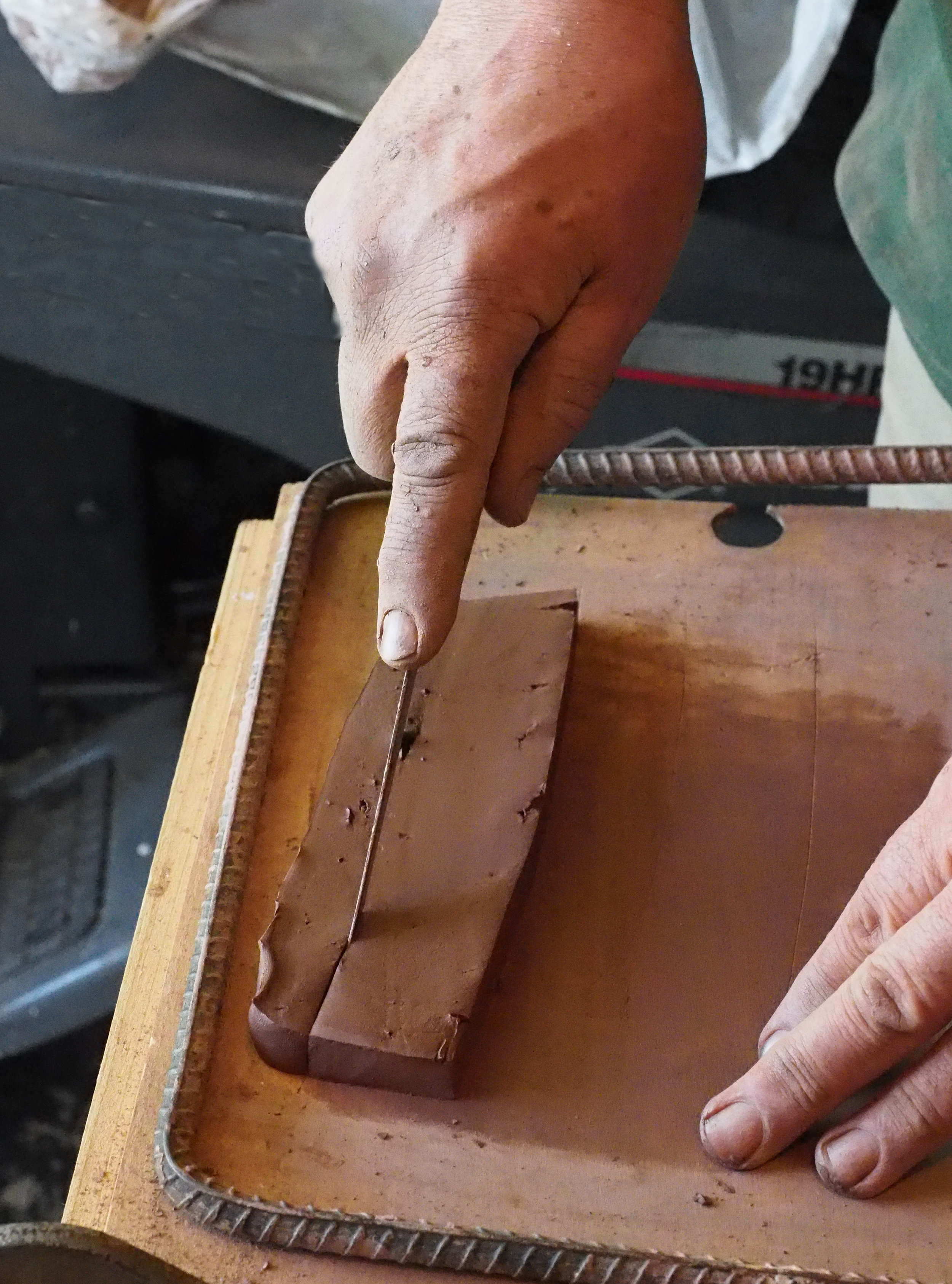  The model is covered in clay as a separator. 