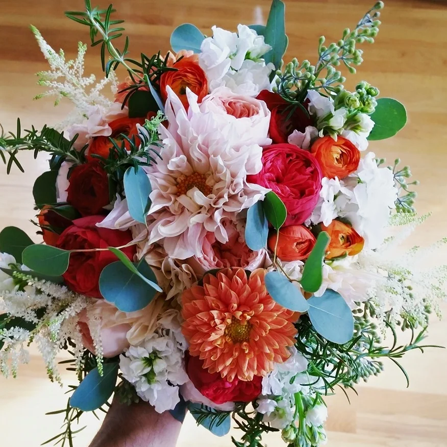 Wild and Fun Combining structural and bold focal floral in a frame of architectural accents reads adventurous and fun.
