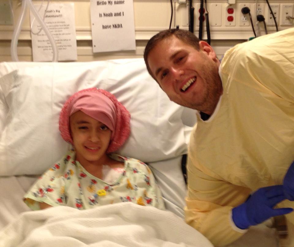 Noah in the hospital, smiling for a picture with the legend Jonah Hill, though she was too young to know who he is from any of his movies.