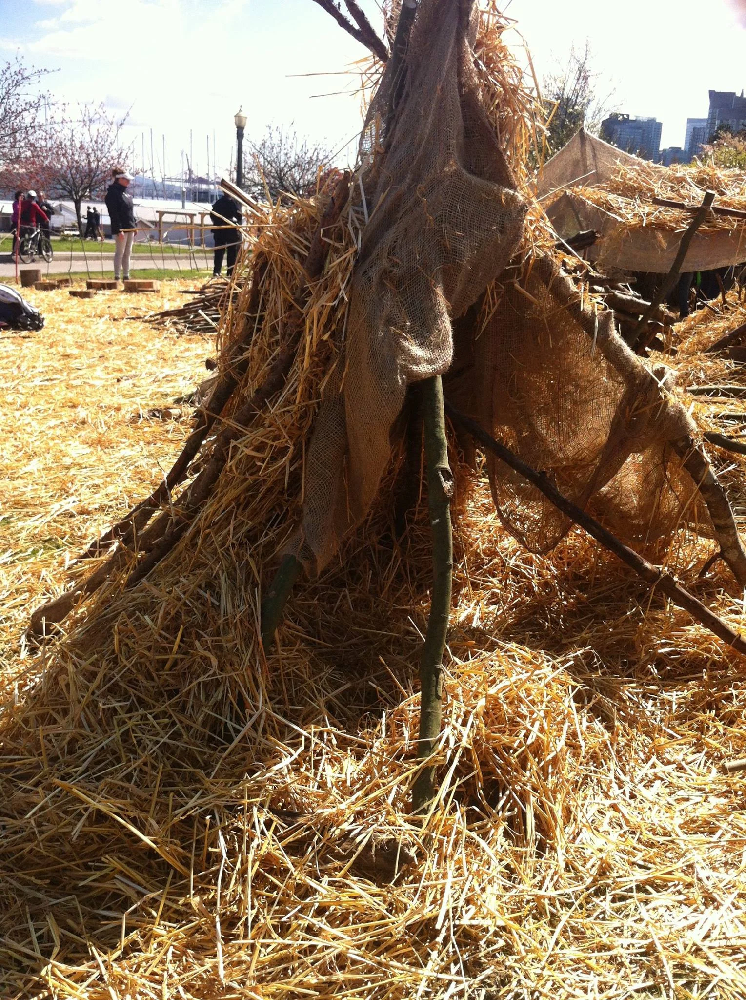 Huts at the pop up playground by Bienenstock Natural Playgrounds - Vancouver