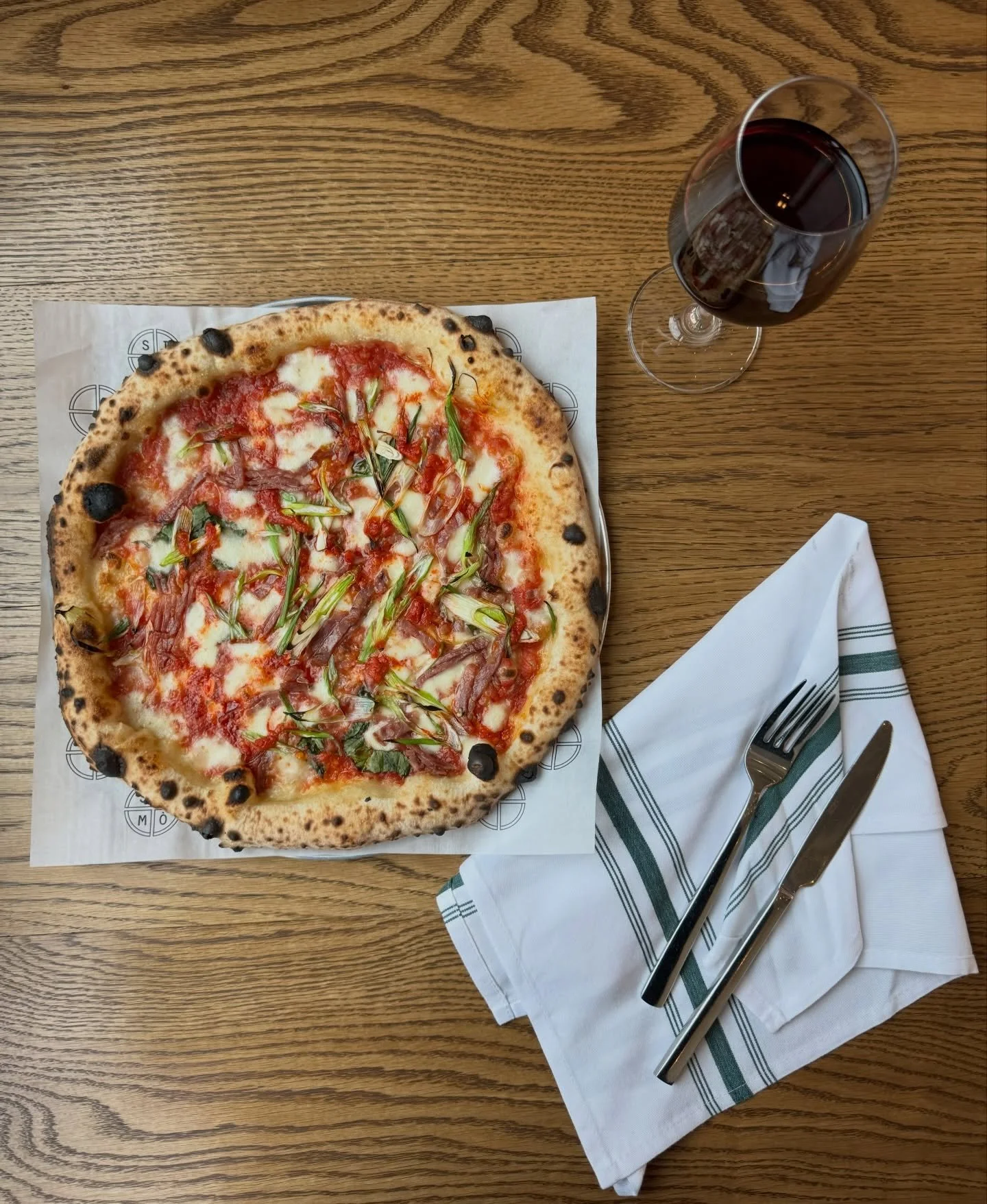Get a taste of a little something special this Spring 🍕

Our current special, The Crazy Calabrese, paired with a glass of delicious vino della casa (house wine) is sure to be exactly what you&rsquo;re craving 😋🍷

#simopizza #90secondstonapoli #piz