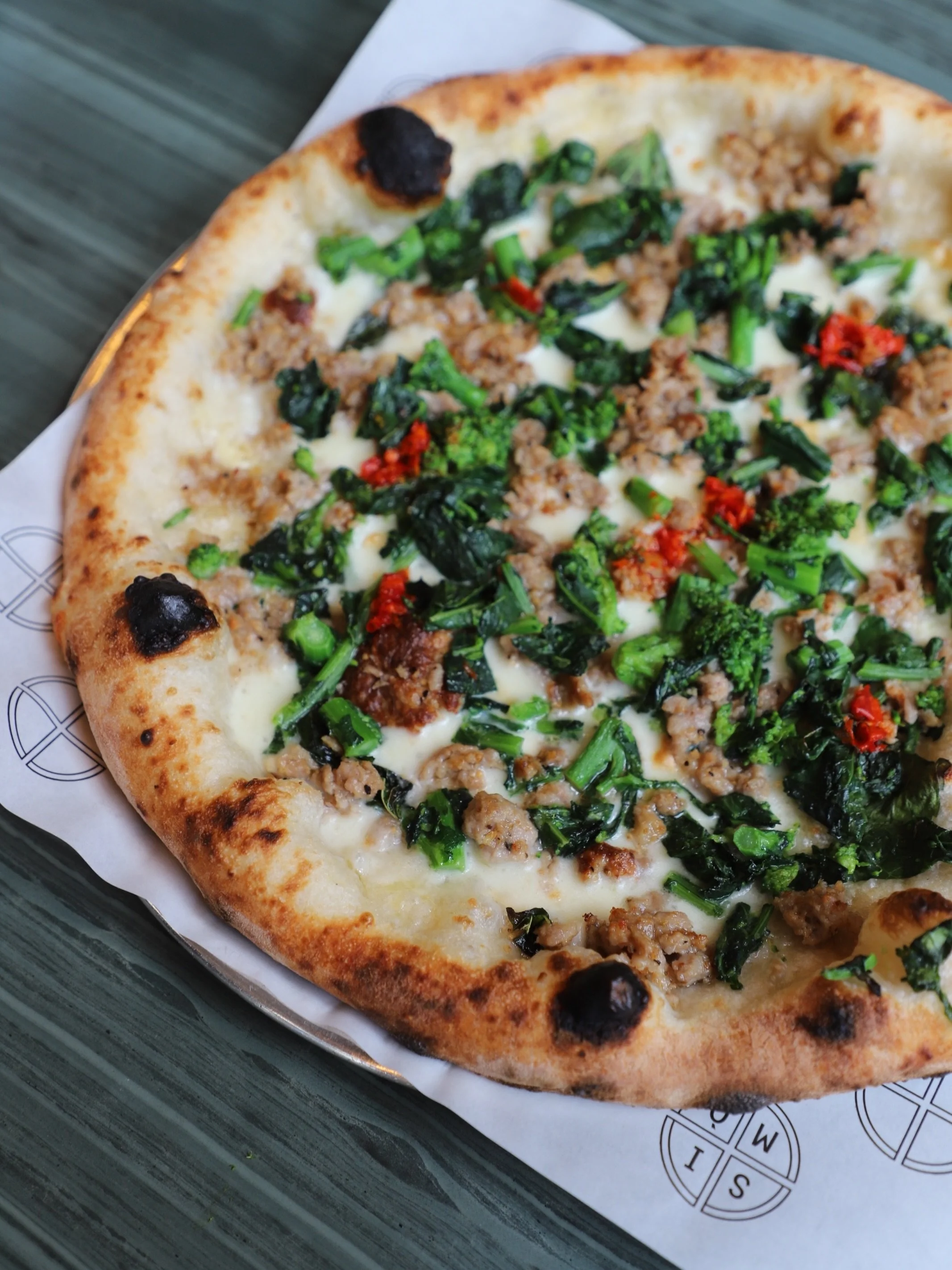 Did you know that any ingredient from our seasonal special can be added to any pizza pie of your choice?! 

The options are endless: The Broccoli Rabe, Calabrian Chili and Sweet Italian Sausage are not to be missed