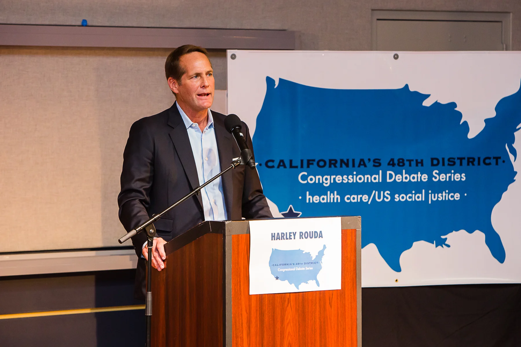 2212_180423_IndivisibleOC48_Debate3-4x6.jpg